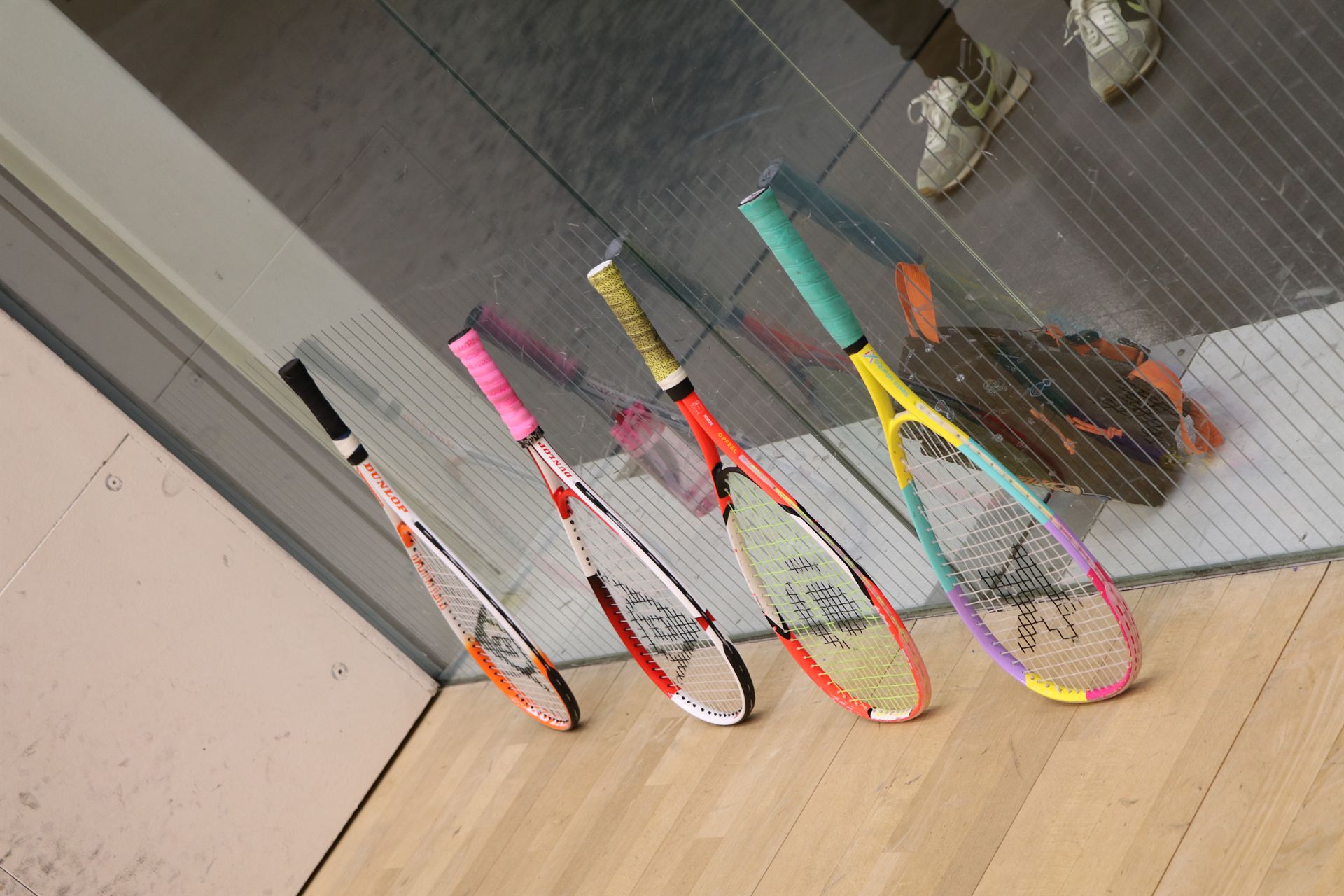Junior squash rackets in bright colours — kit for children aged 5-17 learning squash